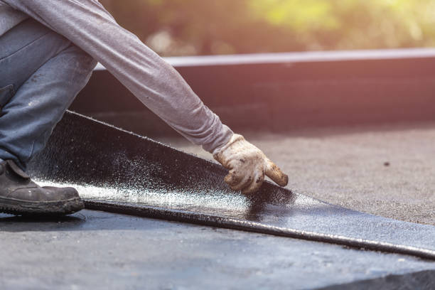 Professional Basement Waterproofing technician working in Eagan, TN